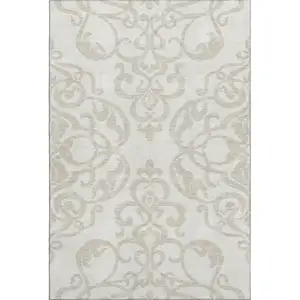 Photo of Ivory And Beige Damask Washable Area Rug With UV Protection