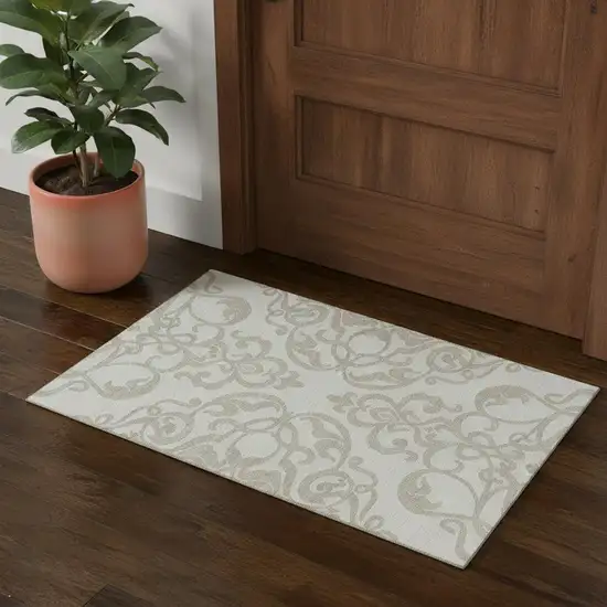 Ivory And Beige Damask Washable Area Rug With UV Protection Photo 1