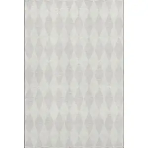 Photo of Ivory And Beige Diamond Washable Area Rug With UV Protection