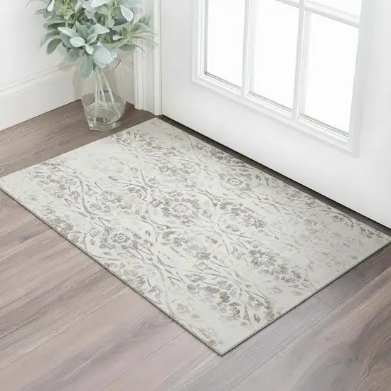 Ivory And Beige Floral Washable Area Rug With UV Protection Photo 1