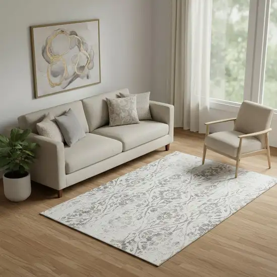 Ivory And Beige Floral Washable Area Rug With UV Protection Photo 1