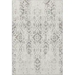 Photo of Ivory And Beige Floral Washable Area Rug With UV Protection