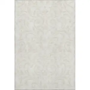 Photo of Ivory And Beige Floral Washable Area Rug With UV Protection
