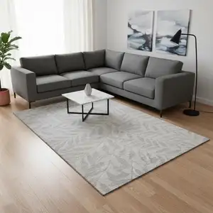 Photo of Ivory And Beige Floral Washable Area Rug With UV Protection
