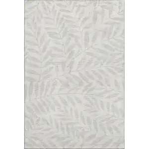 Photo of Ivory And Beige Floral Washable Area Rug With UV Protection