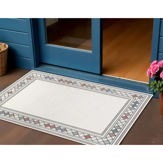 Ivory And Beige Geometric Indoor Outdoor Area Rug Photo 1