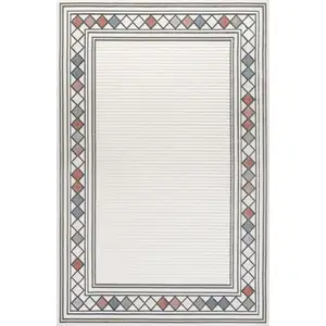 Photo of Ivory And Beige Geometric Indoor Outdoor Area Rug