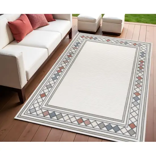 Ivory And Beige Geometric Indoor Outdoor Area Rug Photo 1