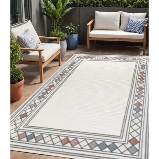 Ivory And Beige Geometric Indoor Outdoor Area Rug Photo 1
