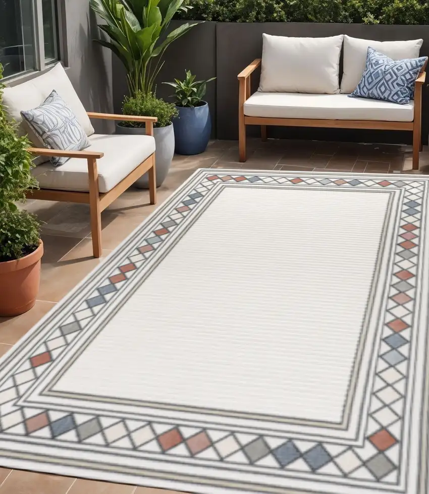 Ivory And Beige Geometric Indoor Outdoor Area Rug Photo 1