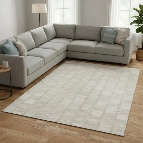 Ivory And Beige Geometric Washable Area Rug With UV Protection Photo 1