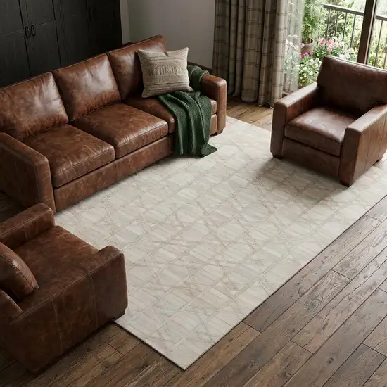 Ivory And Beige Geometric Washable Area Rug With UV Protection Photo 1