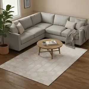 Photo of Ivory And Beige Geometric Washable Area Rug With UV Protection