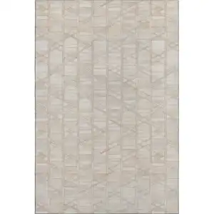 Photo of Ivory And Beige Geometric Washable Area Rug With UV Protection
