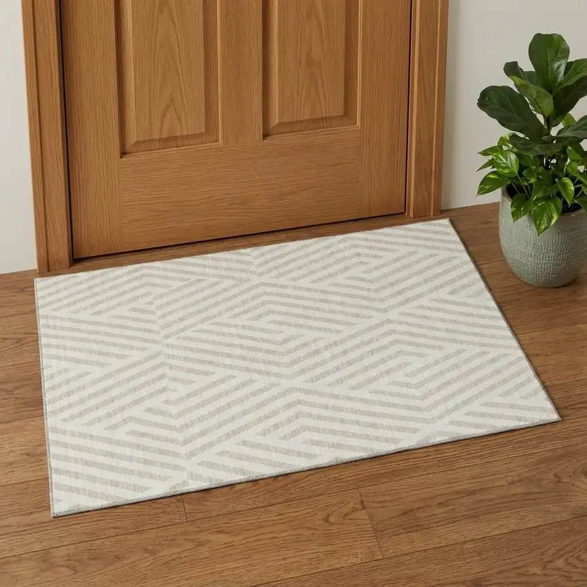Ivory And Beige Geometric Washable Area Rug With UV Protection Photo 1