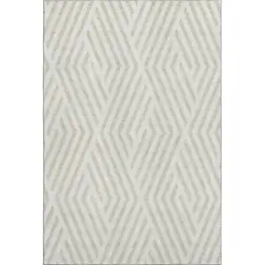 Photo of Ivory And Beige Geometric Washable Area Rug With UV Protection