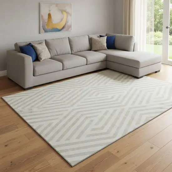 Ivory And Beige Geometric Washable Area Rug With UV Protection Photo 1