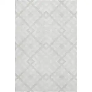 Photo of Ivory And Beige Geometric Washable Area Rug With UV Protection
