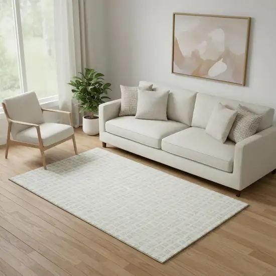 Ivory And Beige Geometric Washable Area Rug With UV Protection Photo 1