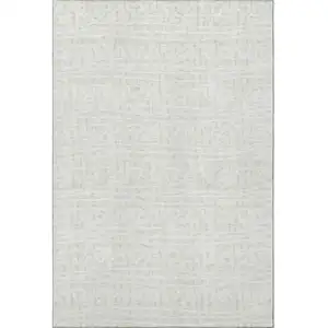 Photo of Ivory And Beige Geometric Washable Area Rug With UV Protection
