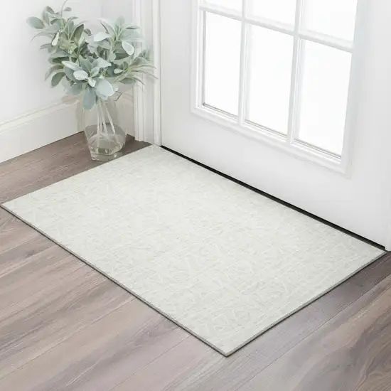 Ivory And Beige Geometric Washable Area Rug With UV Protection Photo 1