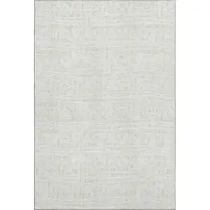 Photo of Ivory And Beige Geometric Washable Area Rug With UV Protection