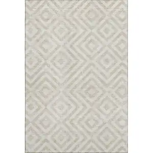 Photo of Ivory And Beige Geometric Washable Area Rug With UV Protection