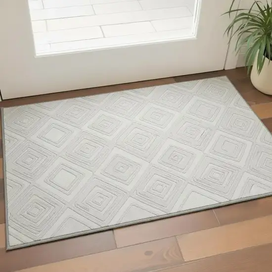 Ivory And Beige Geometric Washable Area Rug With UV Protection Photo 1