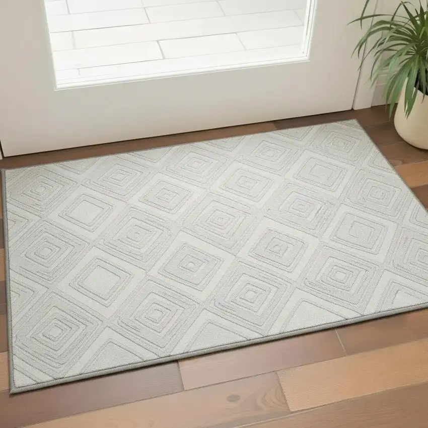 Ivory And Beige Geometric Washable Area Rug With UV Protection Photo 1