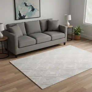 Photo of Ivory And Beige Geometric Washable Area Rug With UV Protection