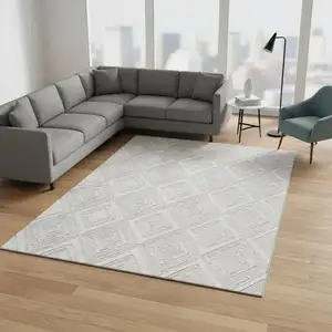 Photo of Ivory And Beige Geometric Washable Area Rug With UV Protection