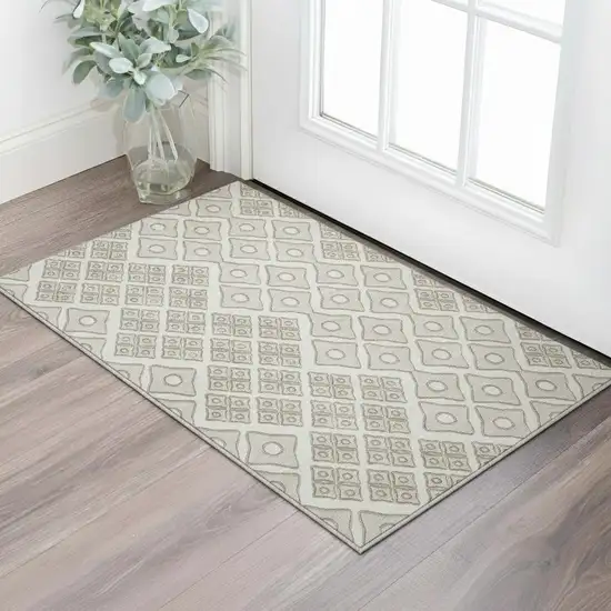 Ivory And Beige Geometric Washable Area Rug With UV Protection Photo 1