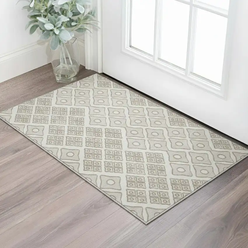 Ivory And Beige Geometric Washable Area Rug With UV Protection Photo 1