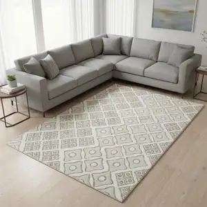 Photo of Ivory And Beige Geometric Washable Area Rug With UV Protection