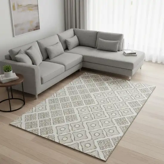 Ivory And Beige Geometric Washable Area Rug With UV Protection Photo 1