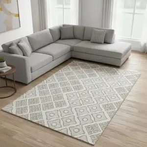 Photo of Ivory And Beige Geometric Washable Area Rug With UV Protection