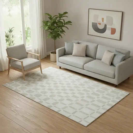 Ivory And Beige Geometric Washable Area Rug With UV Protection Photo 1