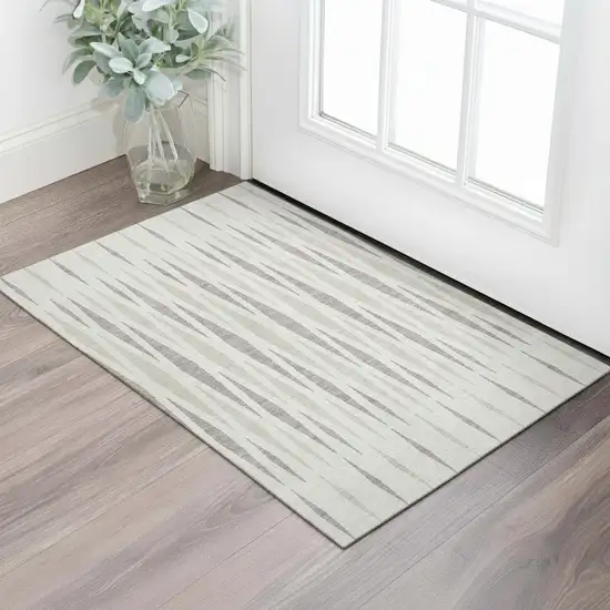 Ivory And Beige Geometric Washable Area Rug With UV Protection Photo 1