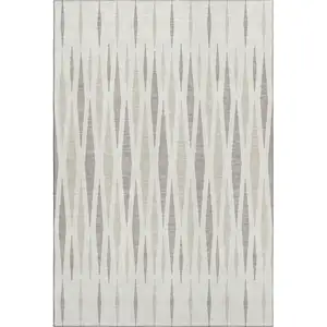 Photo of Ivory And Beige Geometric Washable Area Rug With UV Protection