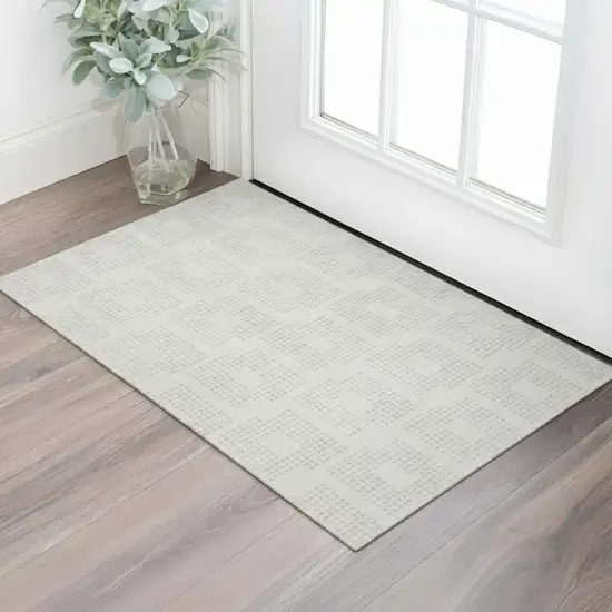 Ivory And Beige Geometric Washable Area Rug With UV Protection Photo 1