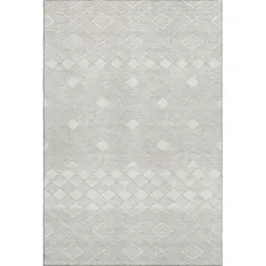 Photo of Ivory And Beige Geometric Washable Area Rug With UV Protection