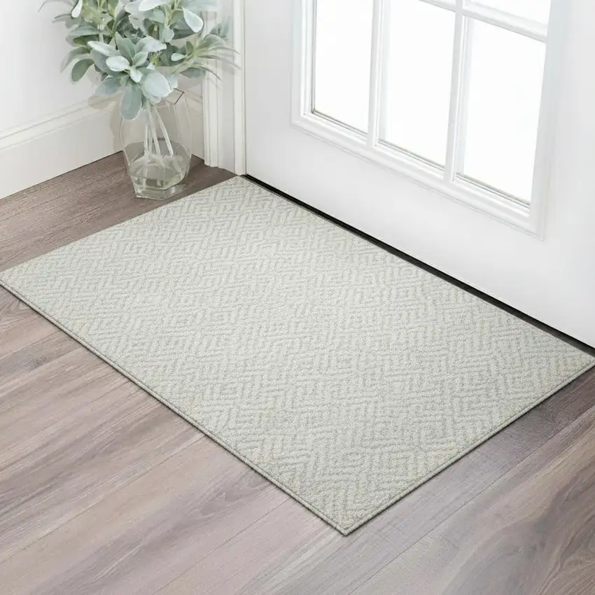 Ivory And Beige Geometric Washable Area Rug With UV Protection Photo 2