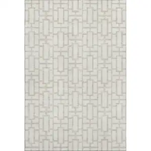 Photo of Ivory And Beige Geometric Washable Area Rug With UV Protection