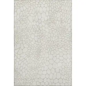 Photo of Ivory And Beige Geometric Washable Area Rug With UV Protection