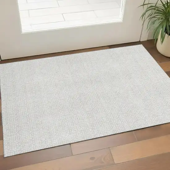 Ivory And Beige Geometric Washable Area Rug With UV Protection Photo 1