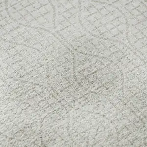 Photo of Ivory And Beige Geometric Washable Area Rug With UV Protection