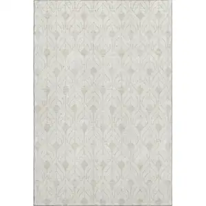 Photo of Ivory And Beige Geometric Washable Area Rug With UV Protection