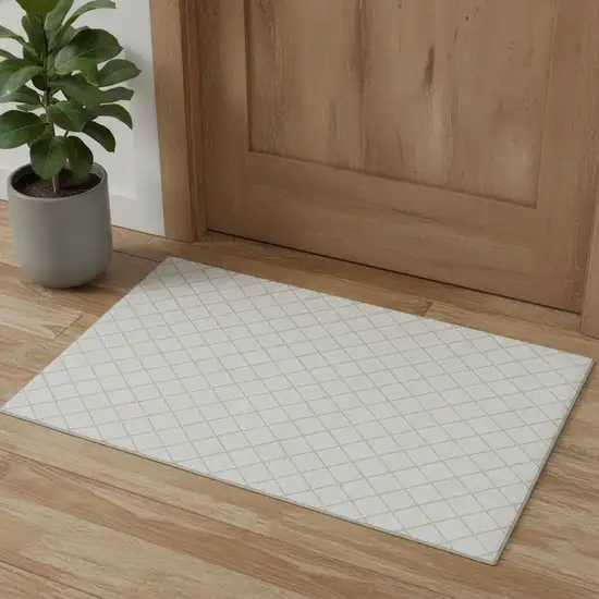 Ivory And Beige Geometric Washable Area Rug With UV Protection Photo 1