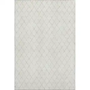 Photo of Ivory And Beige Geometric Washable Area Rug With UV Protection