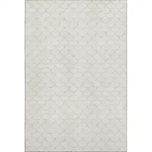 Photo of Ivory And Beige Geometric Washable Area Rug With UV Protection